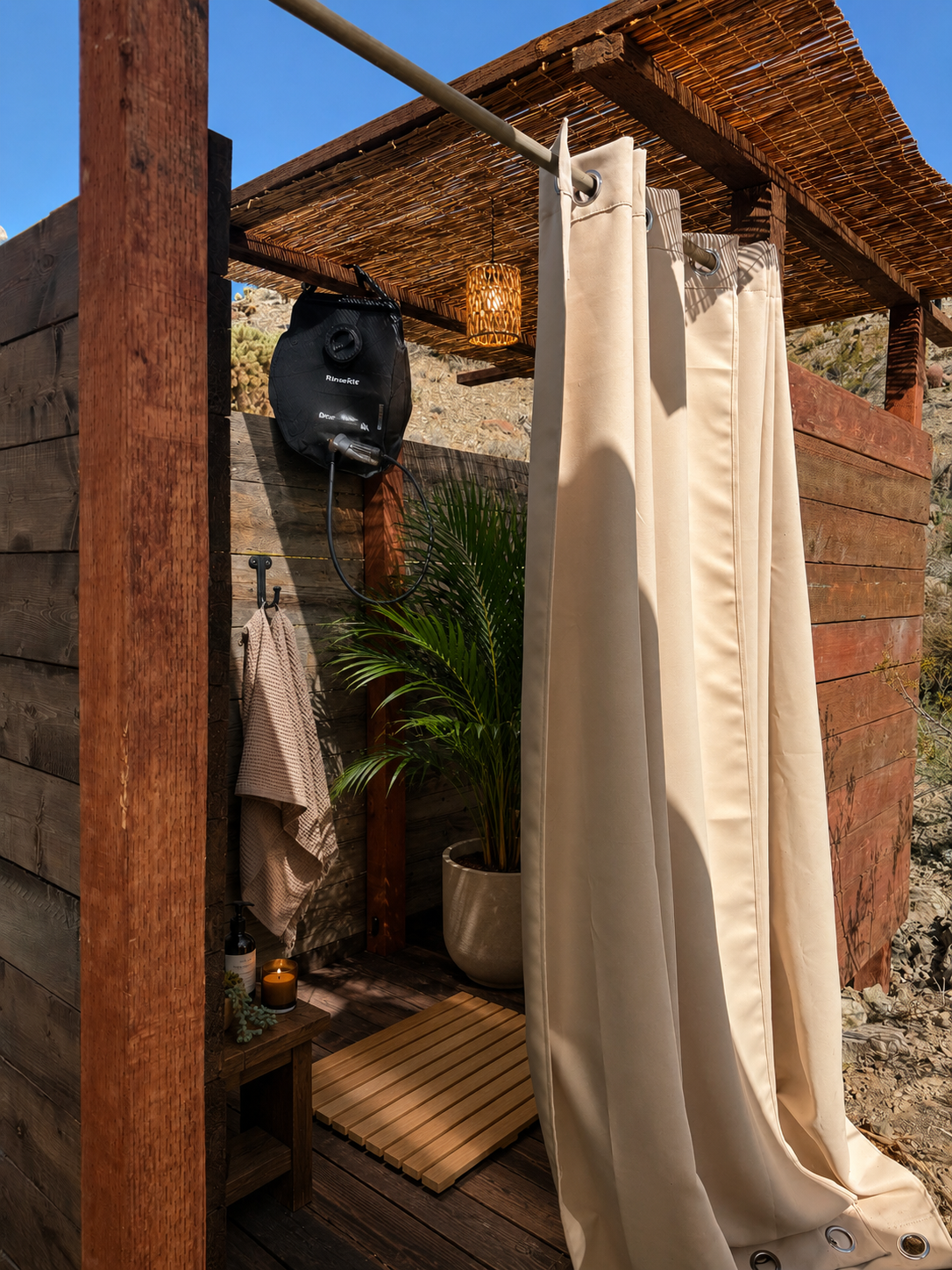 Enjoy this serene outdoor refreshing shower tucked into the mountain landscape